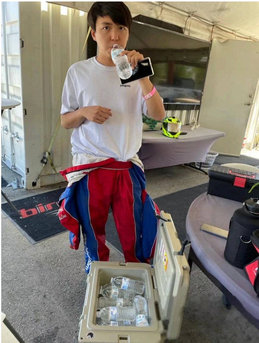 Driver in full karting gear
